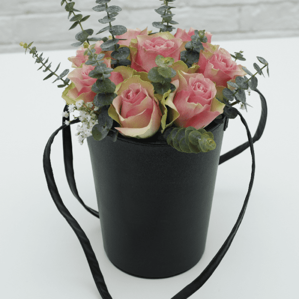 light pink rose in a velvet basket Qatar light pink rose in a velvet basket