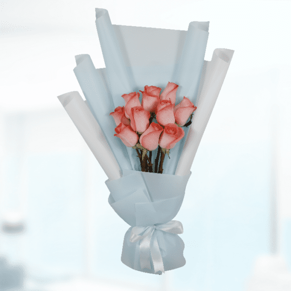 bt_fl_1055 A vibrant bouquet of orange roses arranged elegantly, showcasing their lush petals and green foliage.