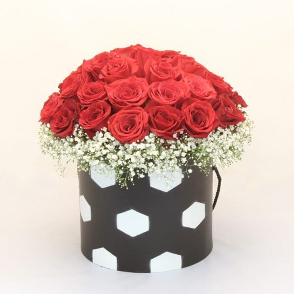 box of red roses with football design box of yellow flowers