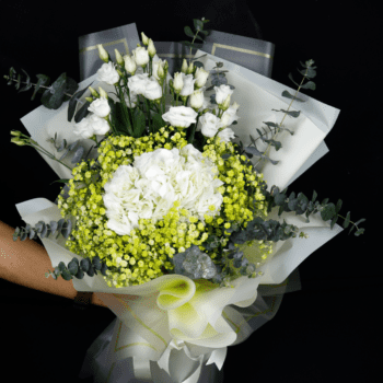 A vibrant bouquet featuring Eustoma, Gypsophila, Hydrangea, and Eucalyptus, radiating joy and beauty.