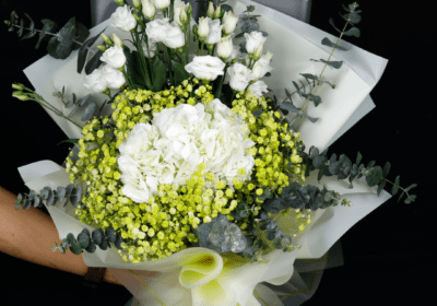 A vibrant bouquet featuring Eustoma, Gypsophila, Hydrangea, and Eucalyptus, radiating joy and beauty.