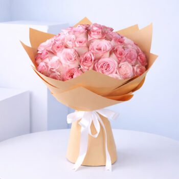 Buy Pink Roses In Brown Wrap