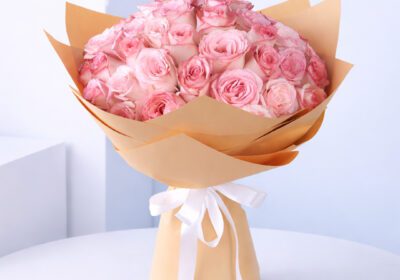 Buy Pink Roses In Brown Wrap