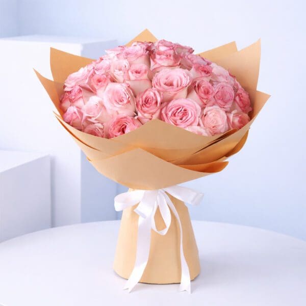 a-heartfelt-gesture_2026 Buy Pink Roses In Brown Wrap