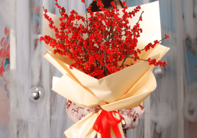 A vibrant Ilex berry bouquet, showcasing seasonal charm and festive beauty in a stunning arrangement of bright red berries.