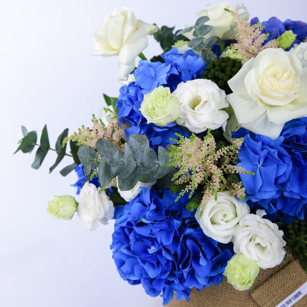 Azure and Ivory flower box by Black Tulip Flowers