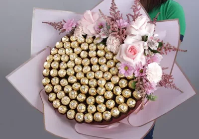 Ferrero Bouquet with Pink Flowers by Black Tulip Flowers