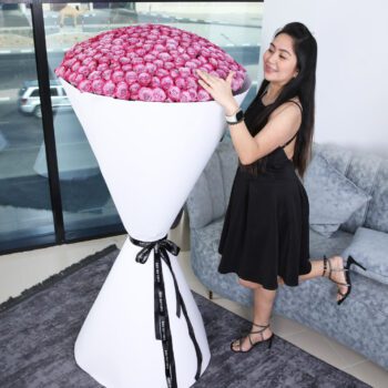 Outstanding Purple Roses Bouquet by Black Tulip Flowers