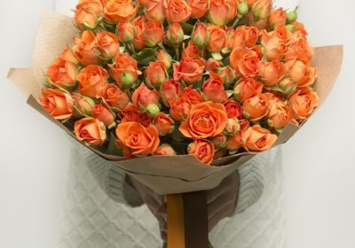 Fascinating Hand Bouquet orange spray rose
