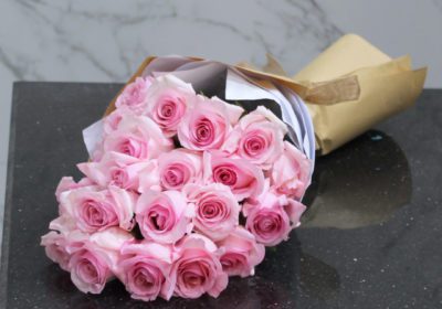 Handcrafted pink rose bouquet by Black Tulip Flowers, elegantly presented and ready for swift delivery in Qatar.