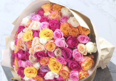 A vibrant bouquet of multicolored roses, perfect for any season and occasion, conveying heartfelt messages of joy.