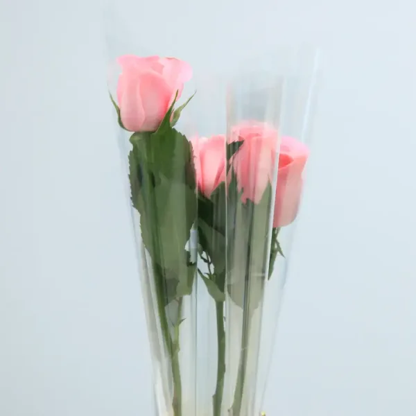 single stem light pink rose wrapped