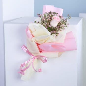 A single stem of Candy Girl Pink flower surrounded by delicate Caspia, creating a charming bouquet.