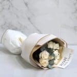 8 creamy white Vendela roses with Eucalyptus leaves 001