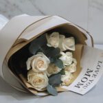 8 creamy white Vendela roses with Eucalyptus leaves 002