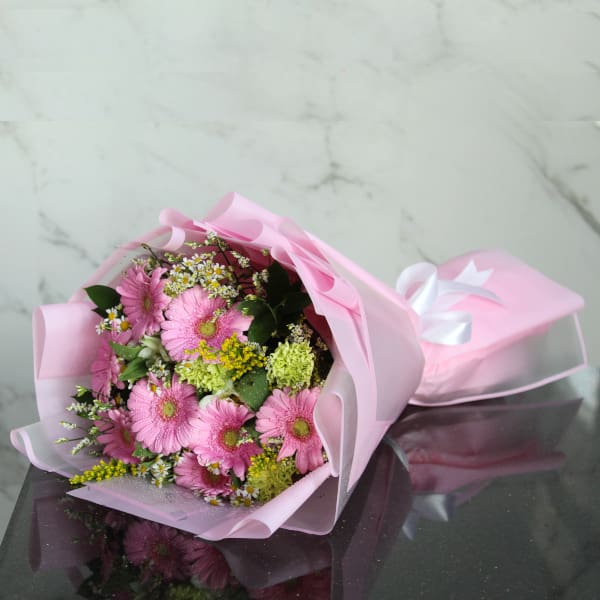 pink gerbera and yellow fillers bouquet 001 Forever Love You Mom bouquet delivery in qatar