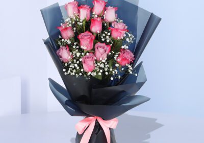 Pink Roses In Black Wrap
