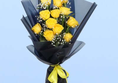 Yellow Roses in Black Wrap