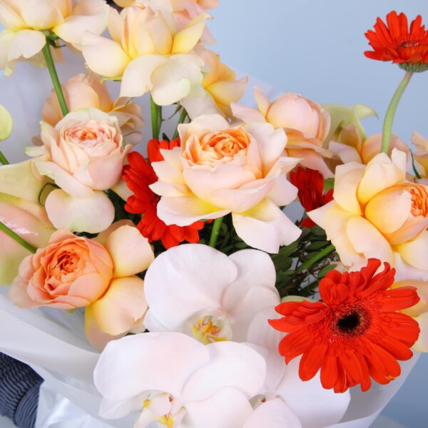 A vibrant bouquet filled with colourful flowers, radiating joy and beauty.