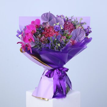 Beautiful purple bouquet featuring a mix of vibrant blooms for an elegant floral display.