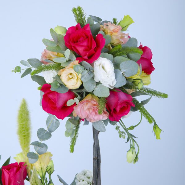 Beautiful Bouquet of Roses in a Basket, Including a Small Rose Tree and Cascading Blooms