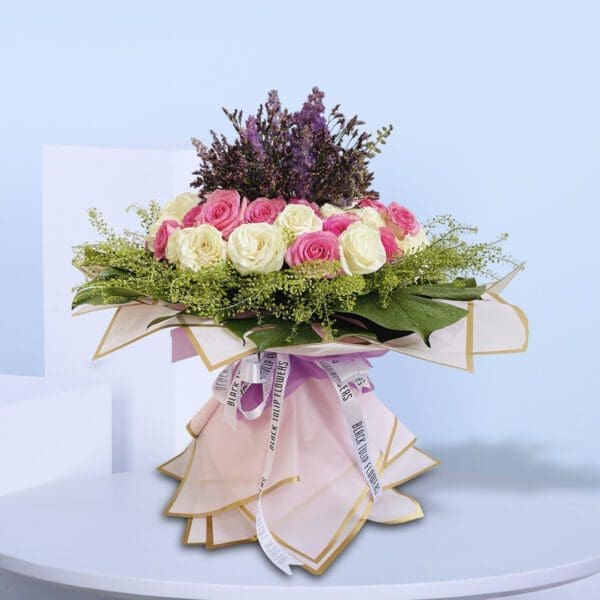 1Heavenly Bloom Delight Sophisticated floral design featuring roses in soft hues, ideal for gifting or home decor.