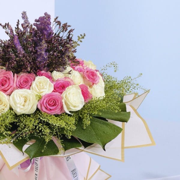 3Heavenly Bloom Delight Sophisticated floral design featuring roses in soft hues, ideal for gifting or home decor.