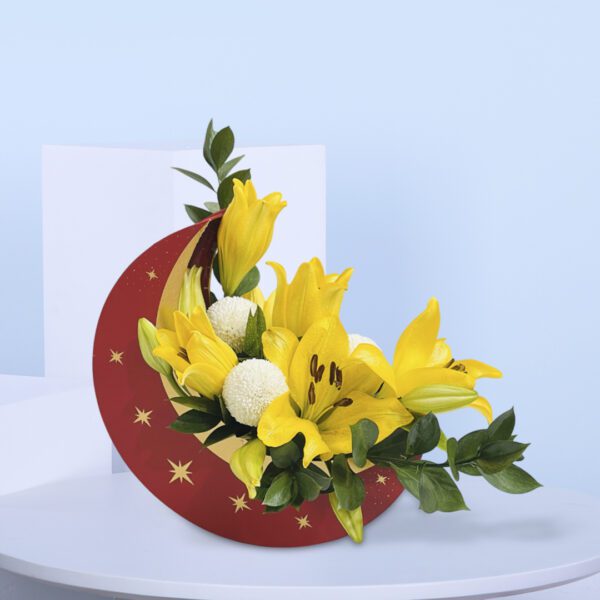 Crescent-shaped arrangement with yellow lilies, white chrysanthemums, and green leaves.