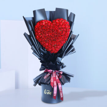 Exquisite bouquet of red roses in a heart shape.