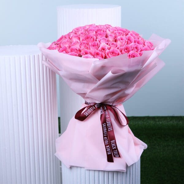 Light Pink Rose Bouquet A beautiful blush pink rose bouquet wrapped in a romantic pink wrap, perfect for gifting your loved ones.