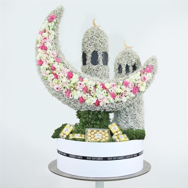 Crescent and mosque-themed floral arrangement with fresh blooms and Ferrero chocolates for Eid.