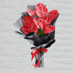 Anthuriums are beautiful tropical flowers with unique, heart-shaped blooms and glossy foliage. Sending an anthurium bouquet – Flat can add a touch of exotic beauty and vibrant colors to any occasion.
