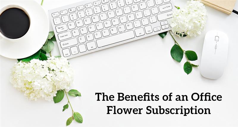 Fresh flower arrangement on an office desk, adding color and boosting mood.