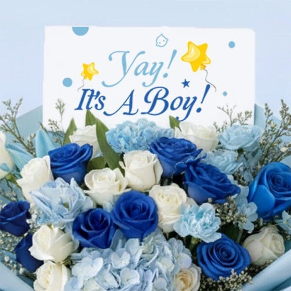 02 Blue baby boy bouquet with roses, hydrangeas, and other blooms and “It’s a Boy” card.
