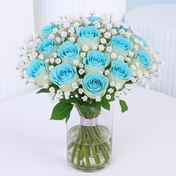 blue-roses-in-glass-vase 20 Painted blue roses with baby’s breath in a clear glass vase.