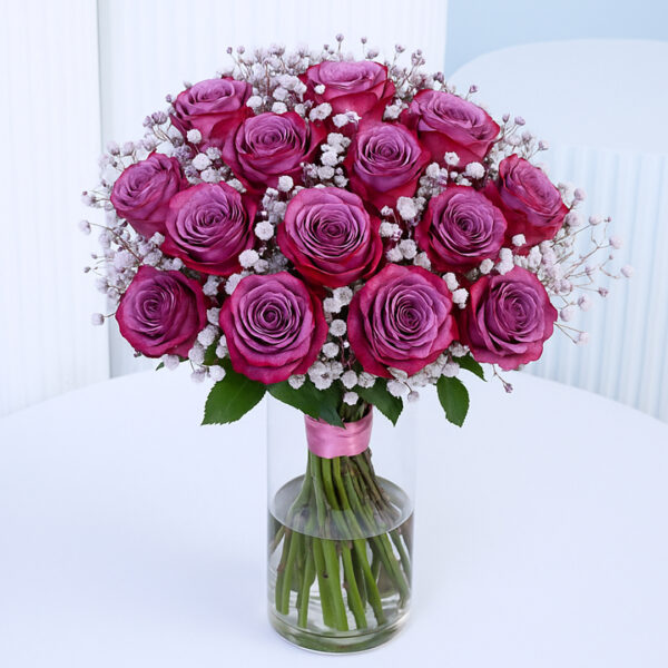 deep-purple-roses-in-glass-vase 20 deep purple roses in a glass vase with baby’s breath