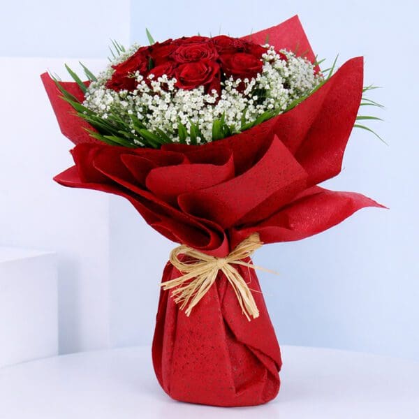 10-red-roses-valentine-bouquet Bouquet featuring 10 red roses, white baby’s breath and green foliage in premium red wrapping