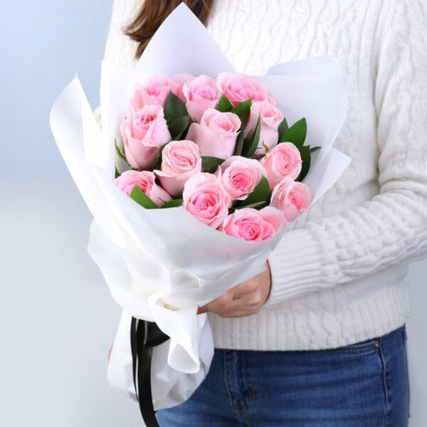 12-light-pink-roses-powder-kiss-vday 12 light pink roses with rusucs in an off white luxury wrap
