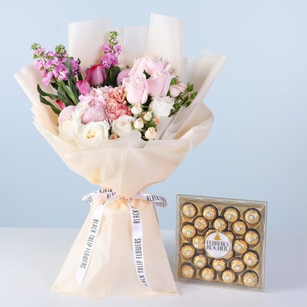classic-pastel-bloom-bouquet-ferrero-24-pcs-combo Classic Pastel Bloom Bouquet Ferrero 24 Pcs featuring mixed pastel flowers including roses, hydrangea, matthiola, carnations, and chocolates for gifting