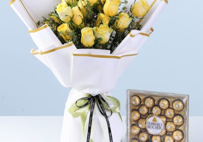 Yellow rose bouquet with Ferrero Rocher chocolate box arranged as a festive gift combo