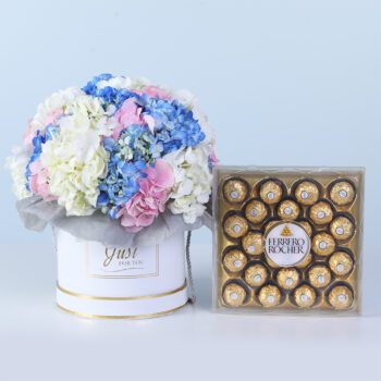 Hydrangea Bliss Gift Box with Ferrero featuring white, blue, and pink hydrangeas with chocolates arranged in a white box for gifting and décor