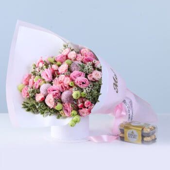 Mothers Day Pink Flower Gift Combo with lisianthus, baby roses, greenery, and Ferrero chocolates arranged beautifully for gifting