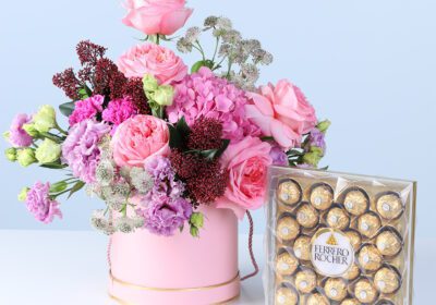 Pastel Pink Harmony Bouquet with Ferrero featuring pink gerberas, roses, lilies, hydrangea, and chocolates arranged in elegant wrapping for gifting