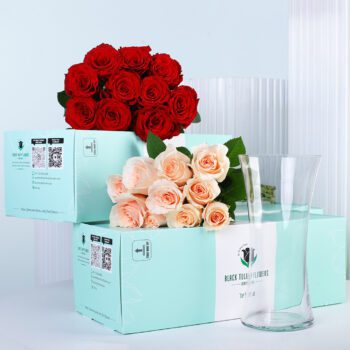 Purple and white rose bunch arranged for a fresh and elegant look. This bunch accompanies free glass vase.