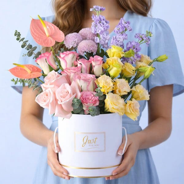 premium-floral-charm-box-mixed-blooms Luxury mixed flower box with matthiola anthurium roses lisianthus and eucalyptus in soft pastel tones