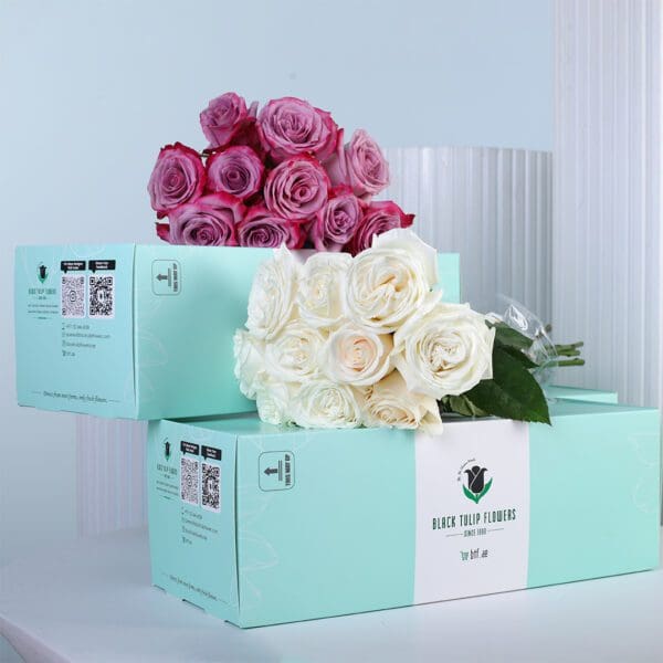 purple-white-rose-harmony-bunch_03 A graceful mix of purple and white roses, thoughtfully arranged and paired with a free glass vase.