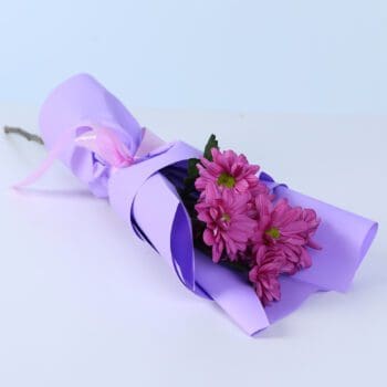 Single purple chrysanthemum bouquet wrapped elegantly as a premium flower gift