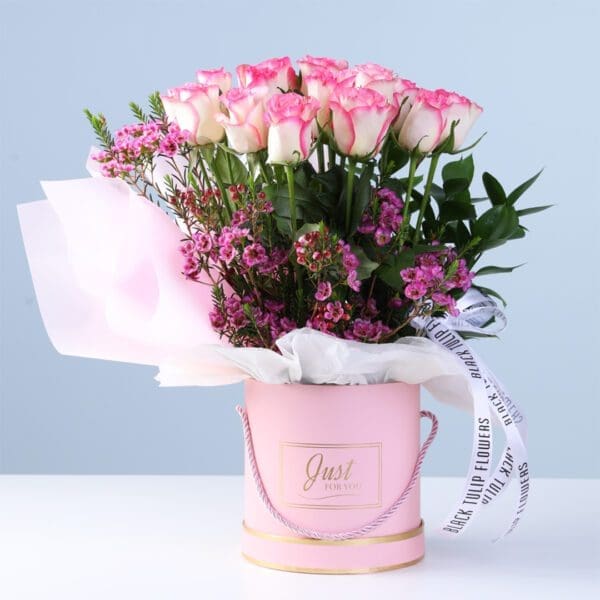 soft-pink-rose-luxury-box-with-ferrero-rocher-16-pcs_02 Soft Pink Rose Luxury Box with Ferrero featuring double pink roses, wax flowers, greenery, and chocolates arranged in a pink box for gifting