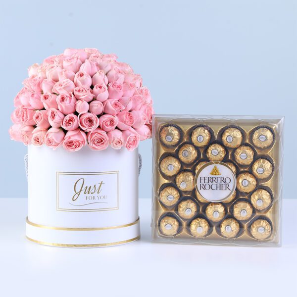 Sweet Pink Rose Box with Ferrero featuring light pink spray roses arranged in a white round box with chocolates for gifting