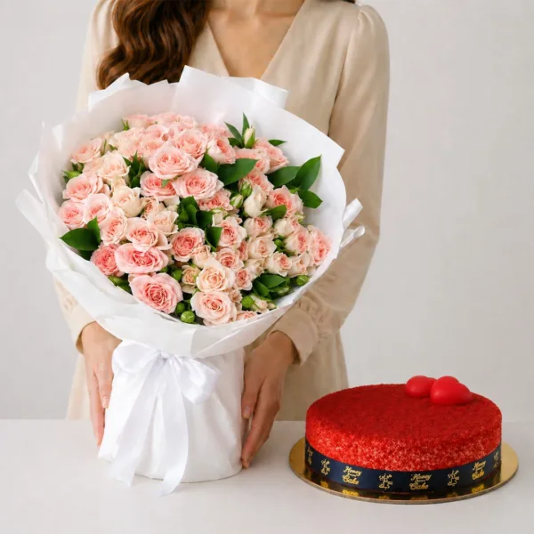 Peach Bloom Cake Surprise featuring peach spray roses paired with a 1kg red velvet cake for gifting and celebrations